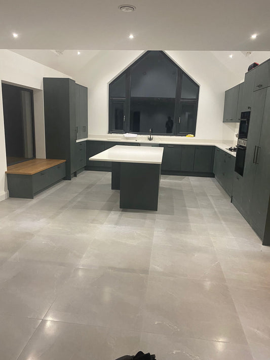 Dark Kitchen Fitted to 3 Walls with Bench